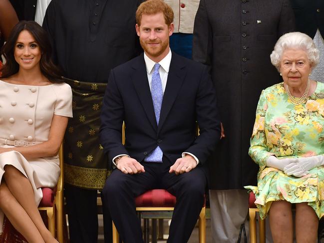 Meghan, Duchess of Sussex, Prince Harry and Queen Elizabeth II. Picture: Getty