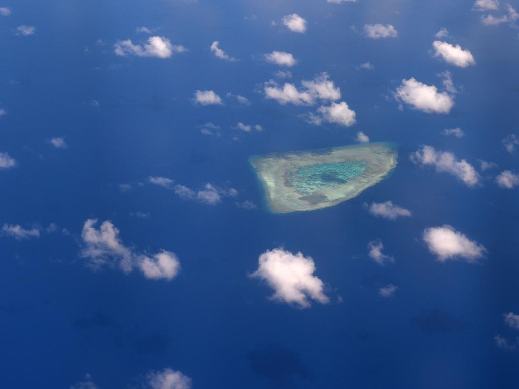 An aerial view of a reef in the disputed Spratly Islands in the South China Sea. Picture: Ted ALJIBE / AFP