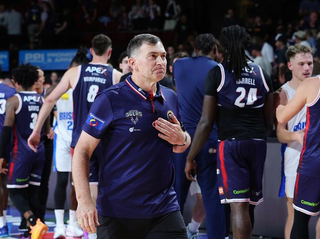 A frustrated 36ers coach Mike Well leaves the court after the loss. Picture: Getty Images