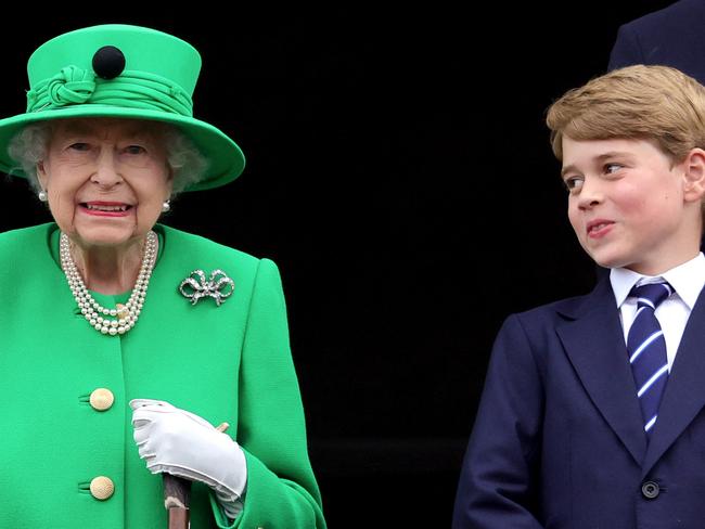 The Queen with Prince George, who is now second in line to the throne. Picture: AFP.