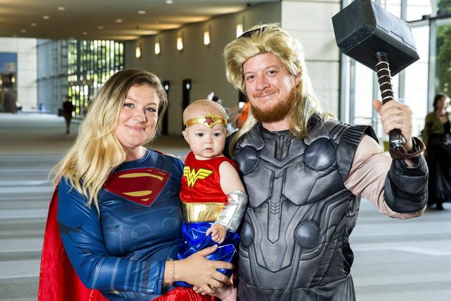 Tomi Restorick with 10-month-old Hazel and Ben Jell from the Sunshine Coast.