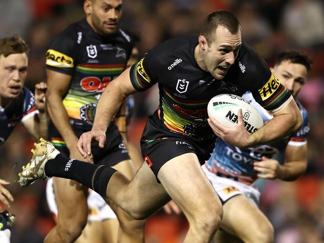 PENRITH, AUSTRALIA - MAY 27: Isaah Yeo of the Panthers breaks a tackle to score a try during the round 12 NRL match between the Penrith Panthers and the North Queensland Cowboys at BlueBet Stadium on May 27, 2022, in Penrith, Australia. (Photo by Matt Blyth/Getty Images)