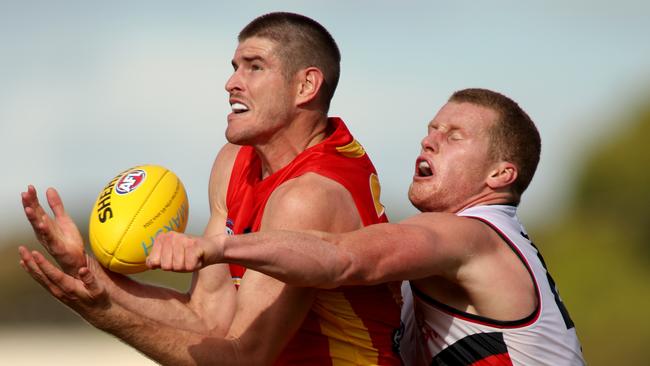 Zac Smith beats Reilly O’Brien to the ball. Picture: AAP Image/Kelly Barnes.