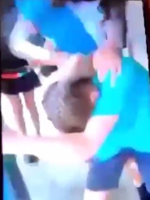 A screenshot from footage of a brawl at the Wanganui campus.