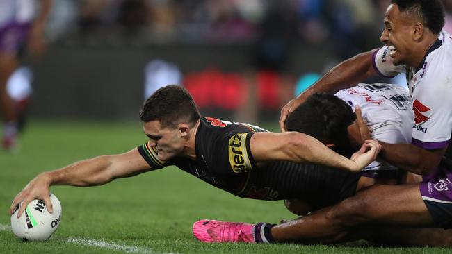 Penrith's Nathan Cleary scoring during the 2020 NRL grand final against Melbourne Storm. . Pic: Brett Costello