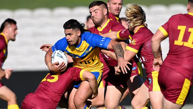 City's Niko Apelu takes a hit-up into the Country defensive line. Picture: NRL Photos/Gregg Porteous.