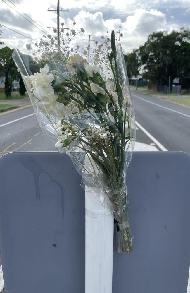 Memorial flowers at Robertson Road, Raceview, on January 8 following a fatal mobility scooter crash. Picture: Nicola McNamara