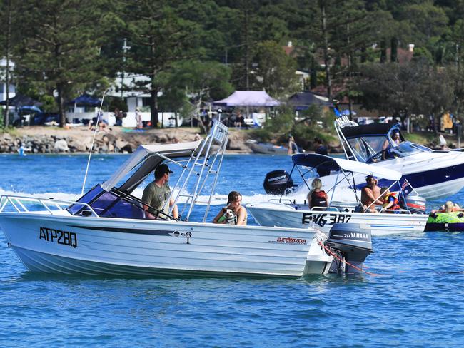 Tallebudgera Creek was packed with families, boats and swimmers all Celebrating Australia Day Photo: Scott Powick