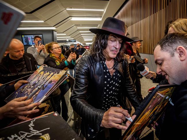 Paul Stanley signs autographs for fans upon arrival at Melbourne Airport to begin the Australian leg of the End of the Road Tour. Picture: Jake Nowakowski
