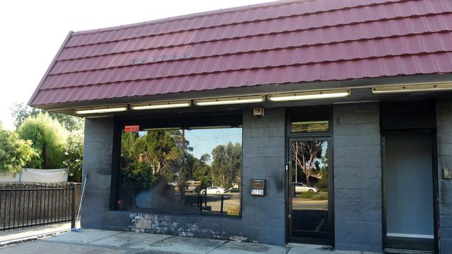 Shops at Morphett Vale were damaged after an arson attack. Picture: Roger Wyman