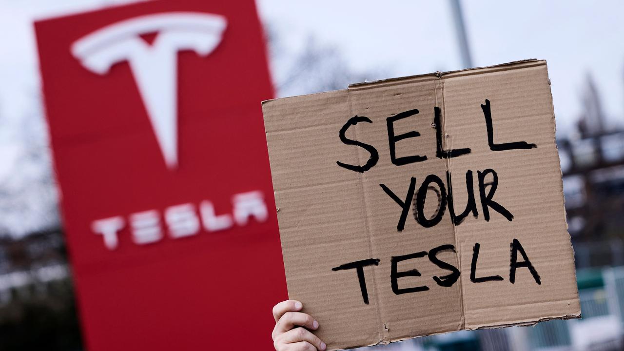 The ‘Tesla Takedown’ movement is spreading across the globe, encouraging citizens to ‘sell their Teslas, get rid of their shares and join the picket lines’. Picture: Benjamin Cremel/AFP