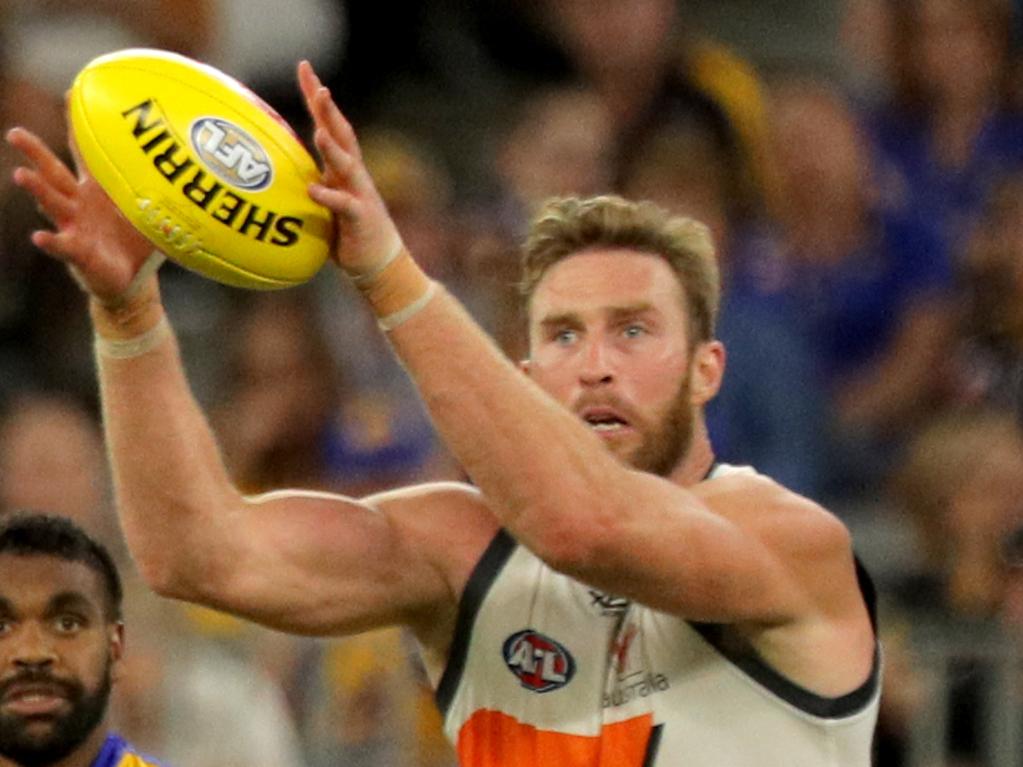 Dawson Simpson of the Giants marks the ball during the Round 2 AFL match between the West Coast Eagles and the GWS Giants at Optus Stadium in Perth, Saturday, March 30, 2019. (AAP Image/Richard Wainwright) NO ARCHIVING, EDITORIAL USE ONLY