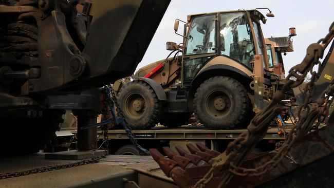 An ADF bulldozer will be one of a convoy of resources deployed across NSW in bushfire ravaged areas. Picture: AAP/Danny Casey