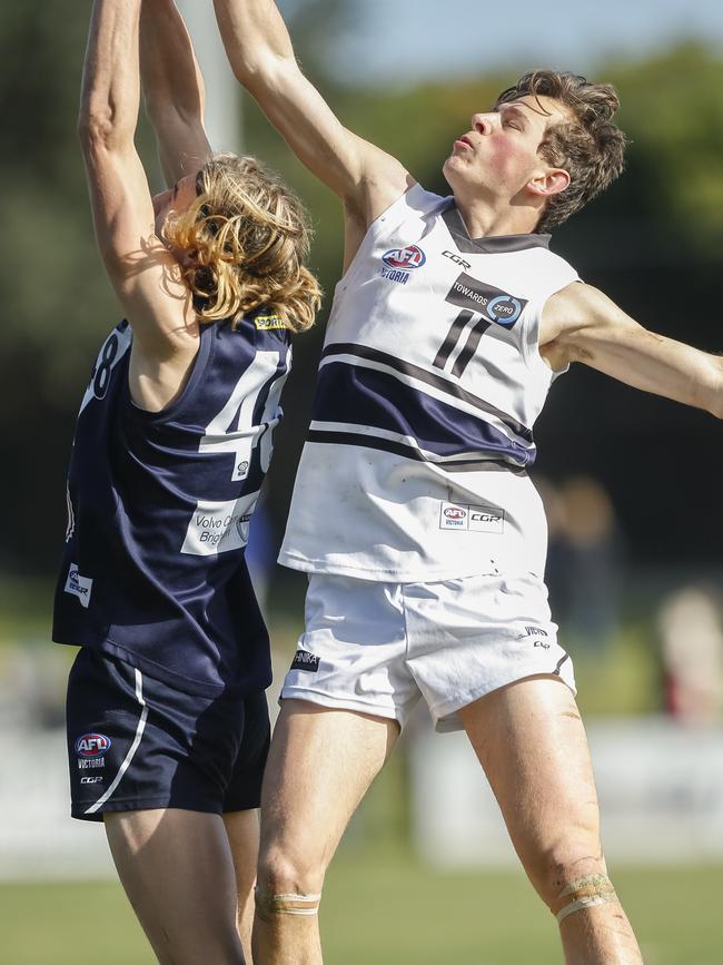 Ryan Sturgess flies for a mark. Picture: Valeriu Campan