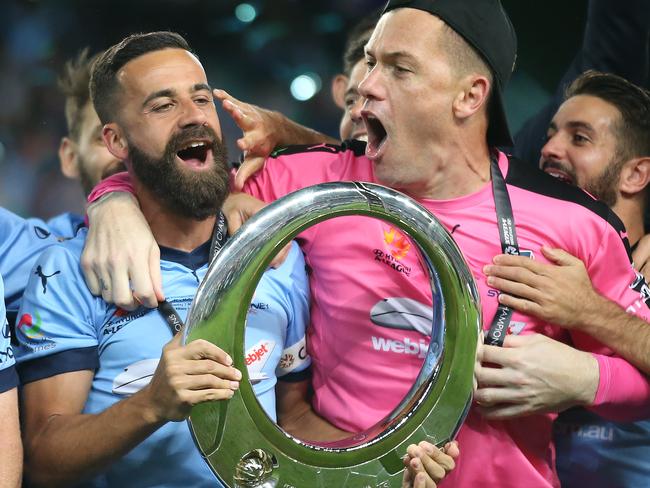 Vukovic with his captain Alex Brosque.