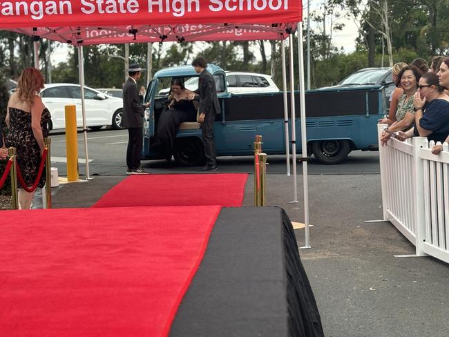 The students of Urangan State High School arriving at their formal.