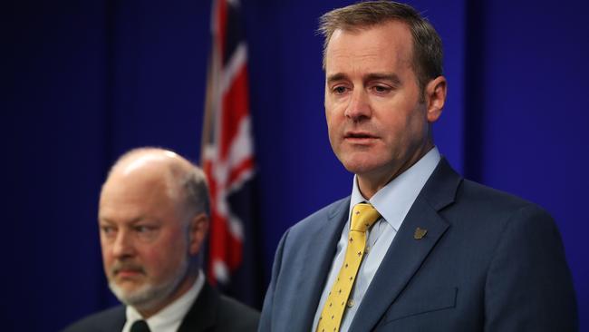 Minister for Health Michael Ferguson, right, and Director of Public Health Mark Veitch announce the extension to the free meningococcal vaccination program. Picture: NIKKI DAVIS-JONES