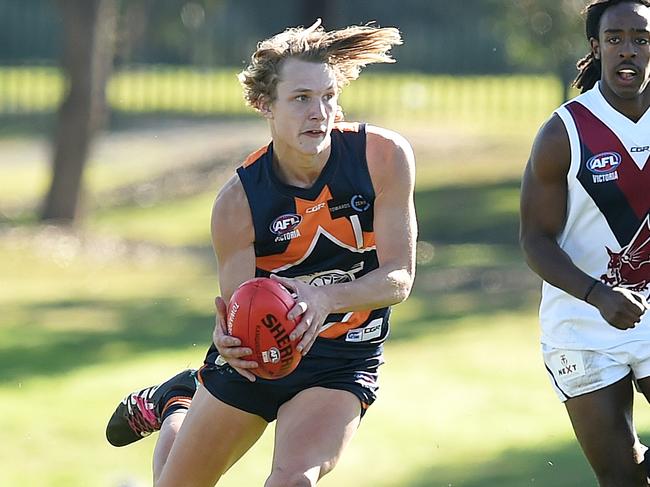 Brad Bernacki weaves through traffic for Calder Cannons in the TAC Cup.