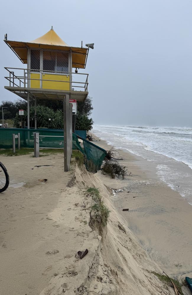 Trees and fencing has also fallen down the sand cliff. Picture: Andrew Potts