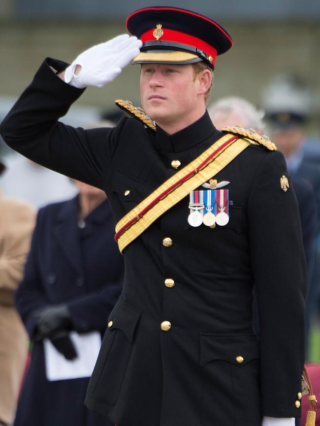 On duty ... Prince Harry, Honorary Air Commandant, visits RAF Honington in 2014. Pic: Paul Edwards - WPA Pool /Getty Images