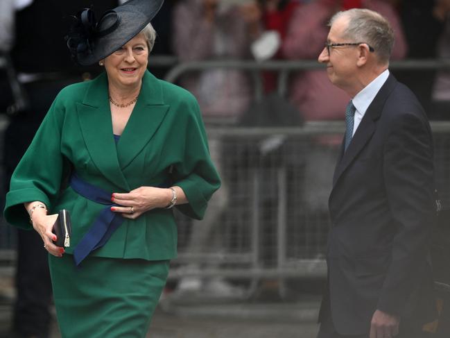 Former Conservative prime minister Theresa May and her husband Philip. Picture: AFP