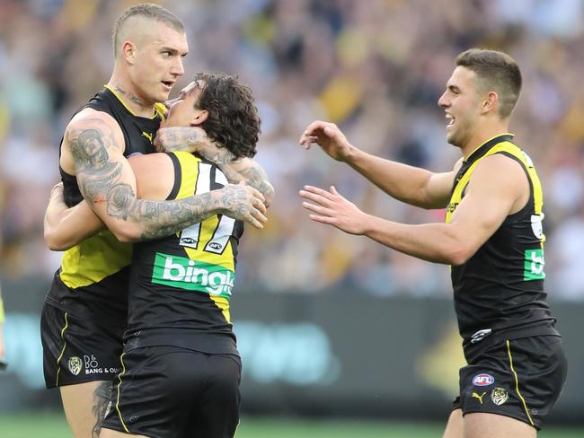 Key men ... Rioli celebrates with Dustin Martin. Picture: Alex Coppel.