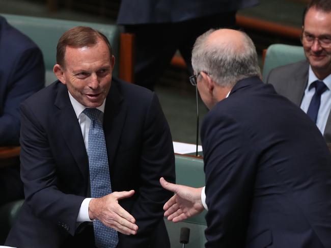 PM Scott Morrison shaking hands with Tony Abbott after he made a Statement on Remote Indigenous Education at Parliament House last Thursday. Picture Kym Smith