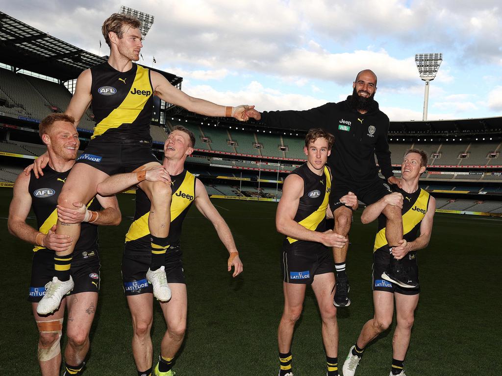 Retiring Tigers David Astbury and Bachar Houli chaired off the MCG in August 2021.