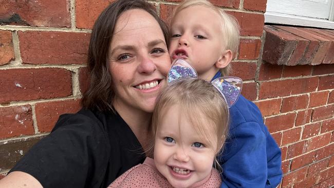 Former RDH worker Emily Bannister, with children Rune and Dolly, is one of thousands forced to wait months for back-pay owed by the Northern Territory government. Picture: Supplied.