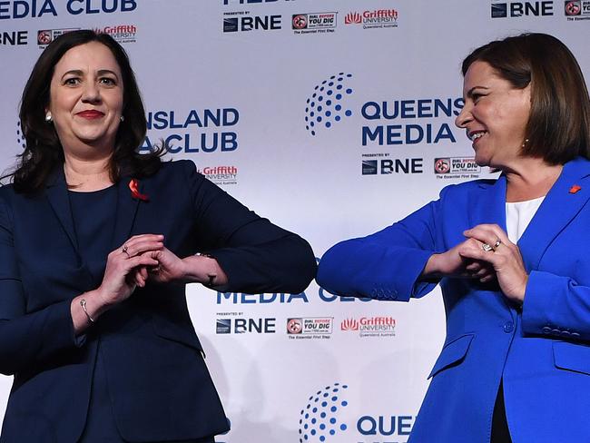 BRISBANE, AUSTRALIA - NewsWire Photos - OCTOBER 30, 2020. Queensland Premier Annastacia Palaszczuk (left) and opposition Leader Deb Frecklington pose for a photo at the conclusion of a leaders debate, ahead of the state election on October 31, at the Brisbane Convention & Exhibition Centre., Picture: NCA NewsWire / Dan Peled