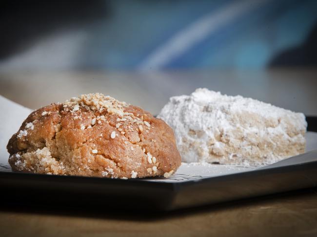 Some of the Parthenon’s traditional sweet treats the Kourambie and the honey-soaked Melomakarona. Picture: Chris Kidd