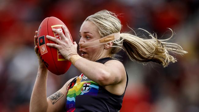 Tarni White has her nose taped after a brutal clash of heads with teammate Olivia Vesely, who was ruled out with concussion.