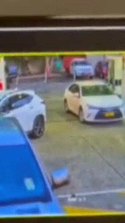 Moment caped killers gun down crime figure