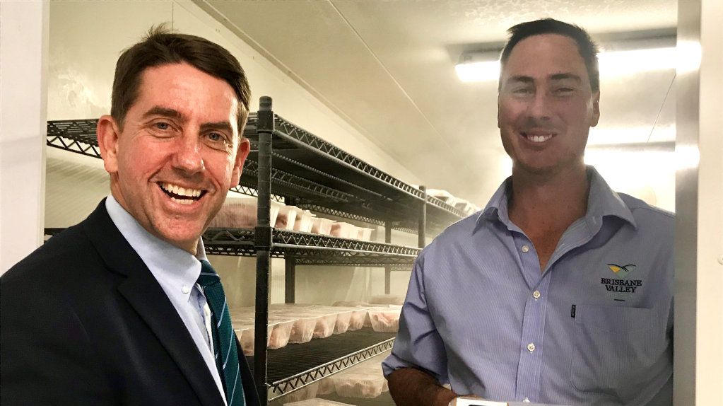 Minister for Manufacturing Cameron Dick with Brisbane Valley Protein project manager Peter McCarthy - and some of the product. Picture: Contributed