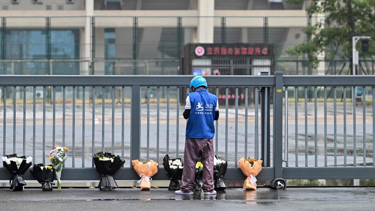 35 people were killed when a man drove a car into a car in the southern city of Zhuhai last week. Picture: Hector Retamal/AFP