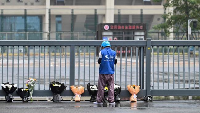 35 people were killed when a man drove a car into a car in the southern city of Zhuhai last week. Picture: Hector Retamal/AFP