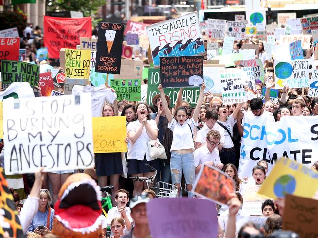 SYDNEY, AUSTRALIA - NOVEMBER 30: Students gather to demand the government take action on climate change at Martin Place on November 30, 2018 in Sydney, Australia. Inspired by Greta Thunberg, a 15-year-old Swedish student who led a strike outside Swedish parliament, thousands of students are expected to walk out of school today in cities across Australia to demand government action on climate change. Prime Minister Scott Morrison urged students to stay in school, telling parliament, "what we want is more learning in schools and less activism in schools".  (Photo by Mark Metcalfe/Getty Images)