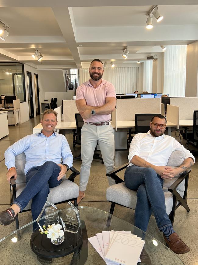 Mark Foy, director of McGrath Surry Hills, left and pictured with sales agents Wes Smuts and Dave Ashby, aims to make a good impression with his work clothes.