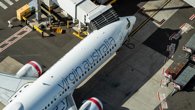 A Virgin Australia plane grounded at Sydney Airport. Picture: Getty Images