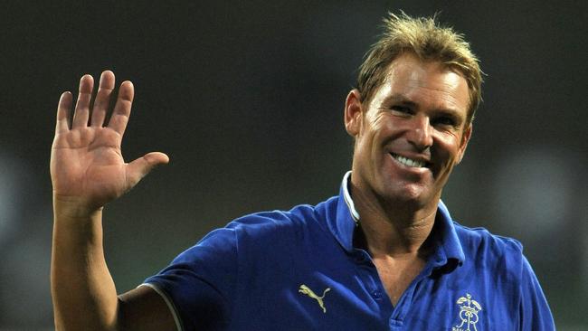 Shane Warne waves to the crowd as he leaves the field after his last international – the IPL Twenty20 match between his Rajasthan Royals and Mumbai Indians at The Wankhede Stadium on May 20, 2011. Picture: Indranil Mukherjee/AFP