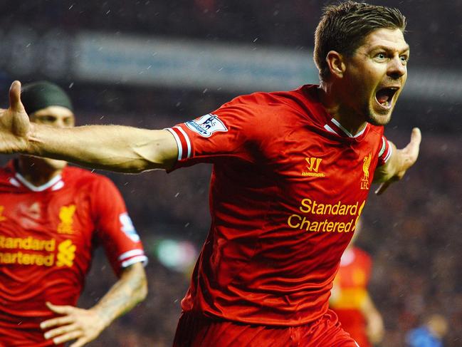 LIVERPOOL, ENGLAND - JANUARY 28: Steven Gerrard of Liverpool celebrates after scoring the opening goal during the Barclays Premier League match between Liverpool and Everton at Anfield on January 28, 2014 in Liverpool, England. (Photo by Laurence Griffiths/Getty Images)