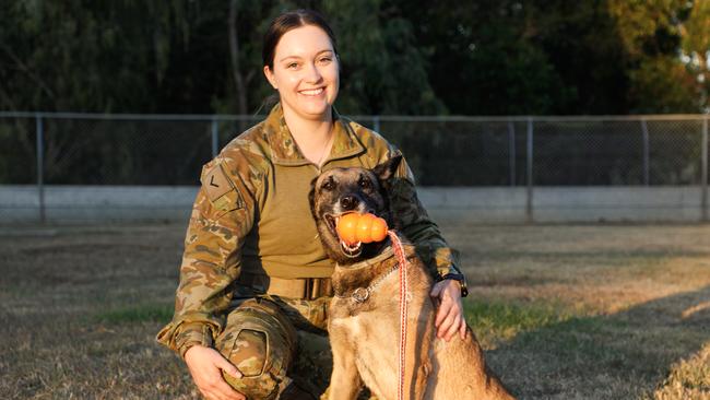 Military Working Dog Handler Leading Aircraftwoman Jessica Johnston with her work partner, Military Working Dog Jackie. Picture: Department of Defence.