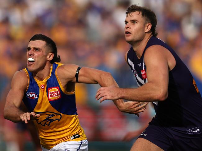 PERTH, AUSTRALIA - APRIL 02: Jake Waterman of the Eagles contests a ruck with Sean Darcy of the Dockers during the 2023 AFL Round 03 match between the Fremantle Dockers and the West Coast Eagles at Optus Stadium on April 2, 2023 in Perth, Australia. (Photo by Will Russell/AFL Photos via Getty Images)