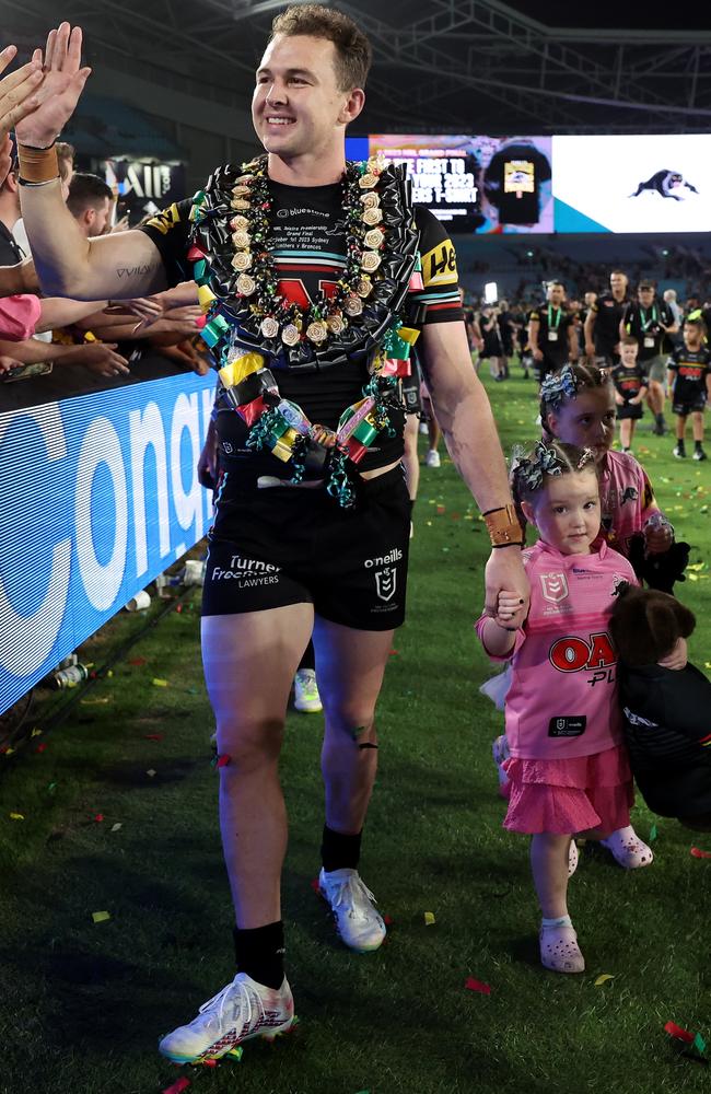 Dylan Edwards celebrates with fans after winning the NRL Grand Final last week. Picture: Matt King/Getty Images