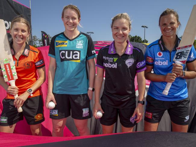 Photo op: Jemma Barsby of the Perth Scorchers, Maddy Green of Brisbane Heat, Nicola Carey of Hobart Hurricanes and Suzie Bates of Adelaide Strikers pose for a photograph ahead of the WBBL festival weekend in Brisbane. Picture: AAP IMAGE/GLENN HUNT