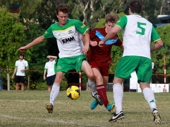 Football Gold Coast Cup quarter-final, Coomera v Kingscliff , played at the Surfers Paradise soccer club . Coomera  Player no10 Adam Endean . Kingscliff   player no5  Daniel Kerwick and 12 Elliot Kahl  Picture Mike Batterham