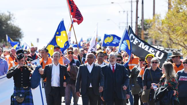 GFG Alliance executive chairman Sanjeev Gupta marches with supporters during a symbolic march down the main street of Whyalla, South Australia, Friday, September 1, 2017. (AAP Image/David Mariuz.