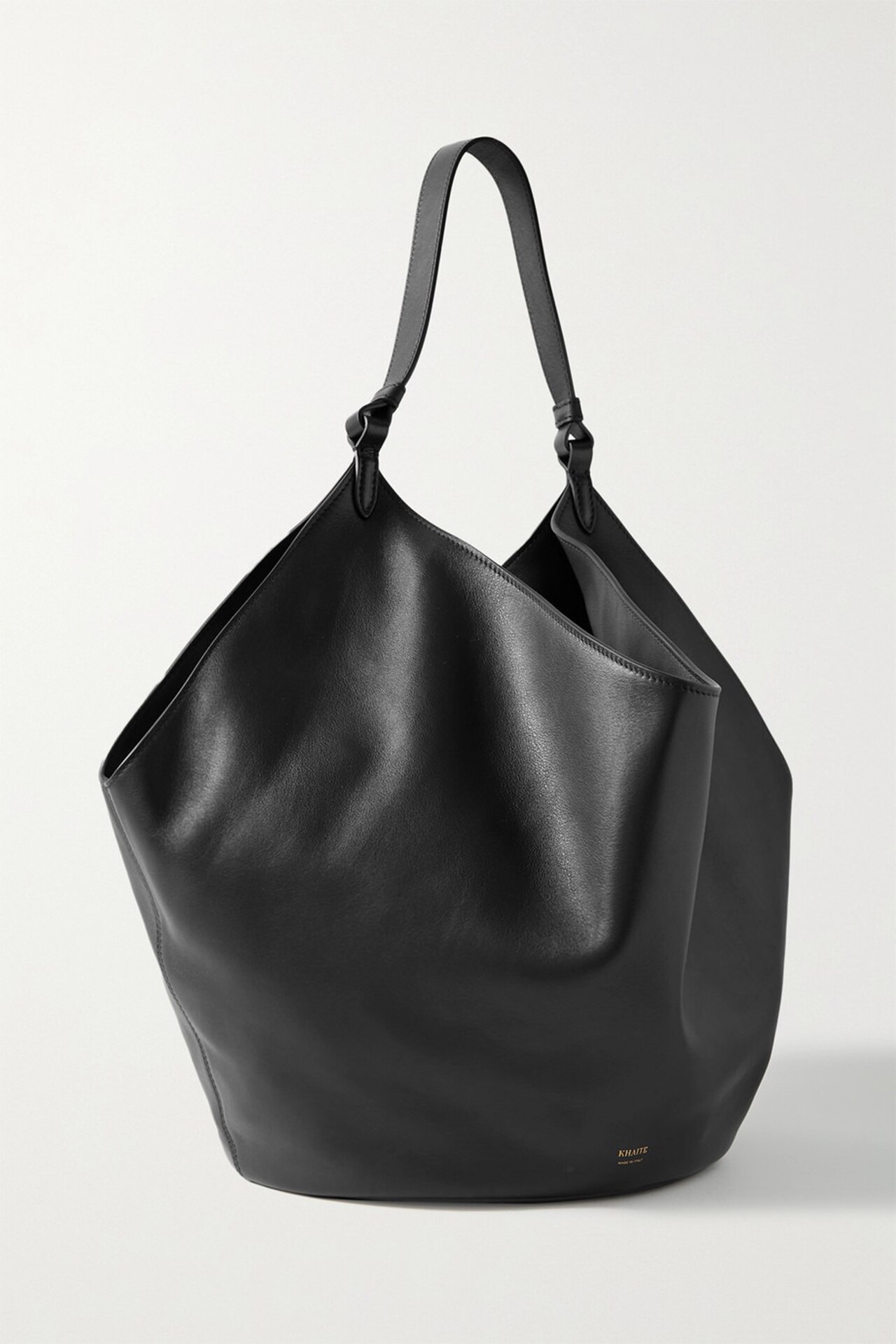 <h3><a href="https://www.net-a-porter.com/en-au/shop/designer/khaite" target="_blank" rel="nofollow noopener">Khaite</a></h3><p>The unstructured design of this Khaite tote lends it aunique sculptural look, whilst still keeping it a casual staple. Unlined and made from buttery Italian leather, this is the ideal bag to throw over your shoulders this summer.</p><p><strong>SHOP NOW:&nbsp;</strong>Khaite Lotus medium leather tote, $2,850 from <strong><a href="https://www.net-a-porter.com/en-au/shop/product/khaite/bags/tote-bags/lotus-medium-leather-tote/17411127376668053" target="_blank" rel="nofollow noopener">Net-A-Porter</a></strong></p>