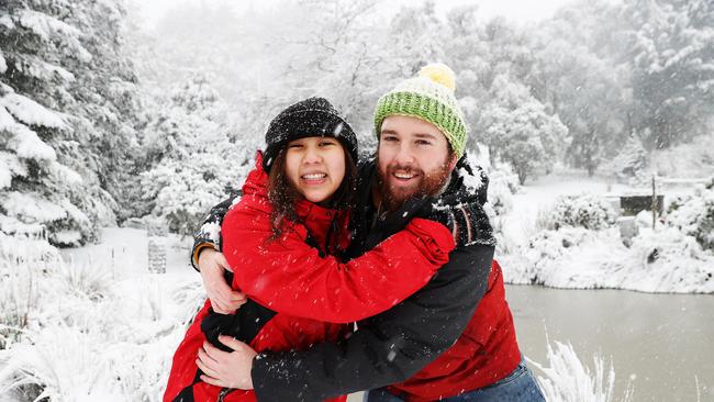 Elliot McLaine with girlfriend Prapasiri Iamsila of Kaoota enjoy the snow. Picture: Zak Simmonds
