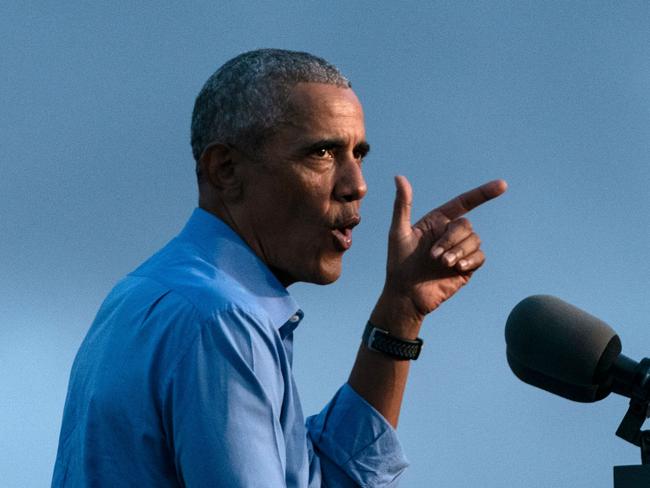 Former US President Barack Obama addresses Biden-Harris supporters during a drive-in rally in Philadelphia, Pennsylvania on October 21, 2020. - Former US president Barack Obama hit the campaign trail for Joe Biden today in a bid to drum up support for his former vice president among young Americans and Black voters in the final stretch of the White House race. (Photo by Alex Edelman / AFP)